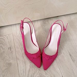 Nine West pink sling back pointed pumps.